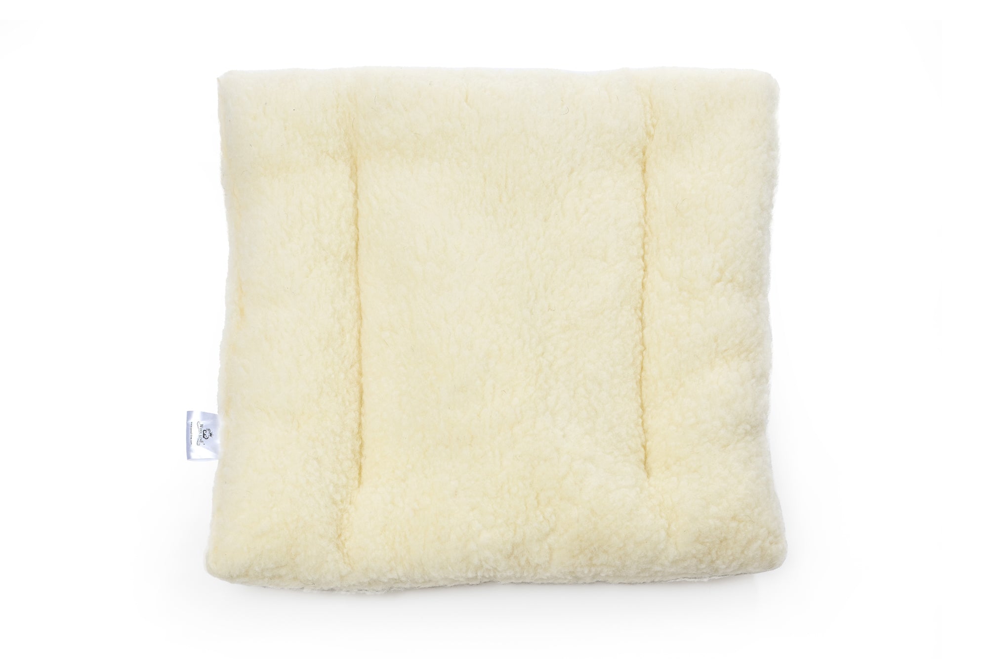 Die Filz Stuhlauflage von Wool-Line auf weißem Untergrund fotografiert. Die Filz-Stuhlauflage kann outdoor auf Gartenbänken oder beim Picknick benutzt werden, oder indoor als Auflage für Bürostühle und Sofas dienen. 